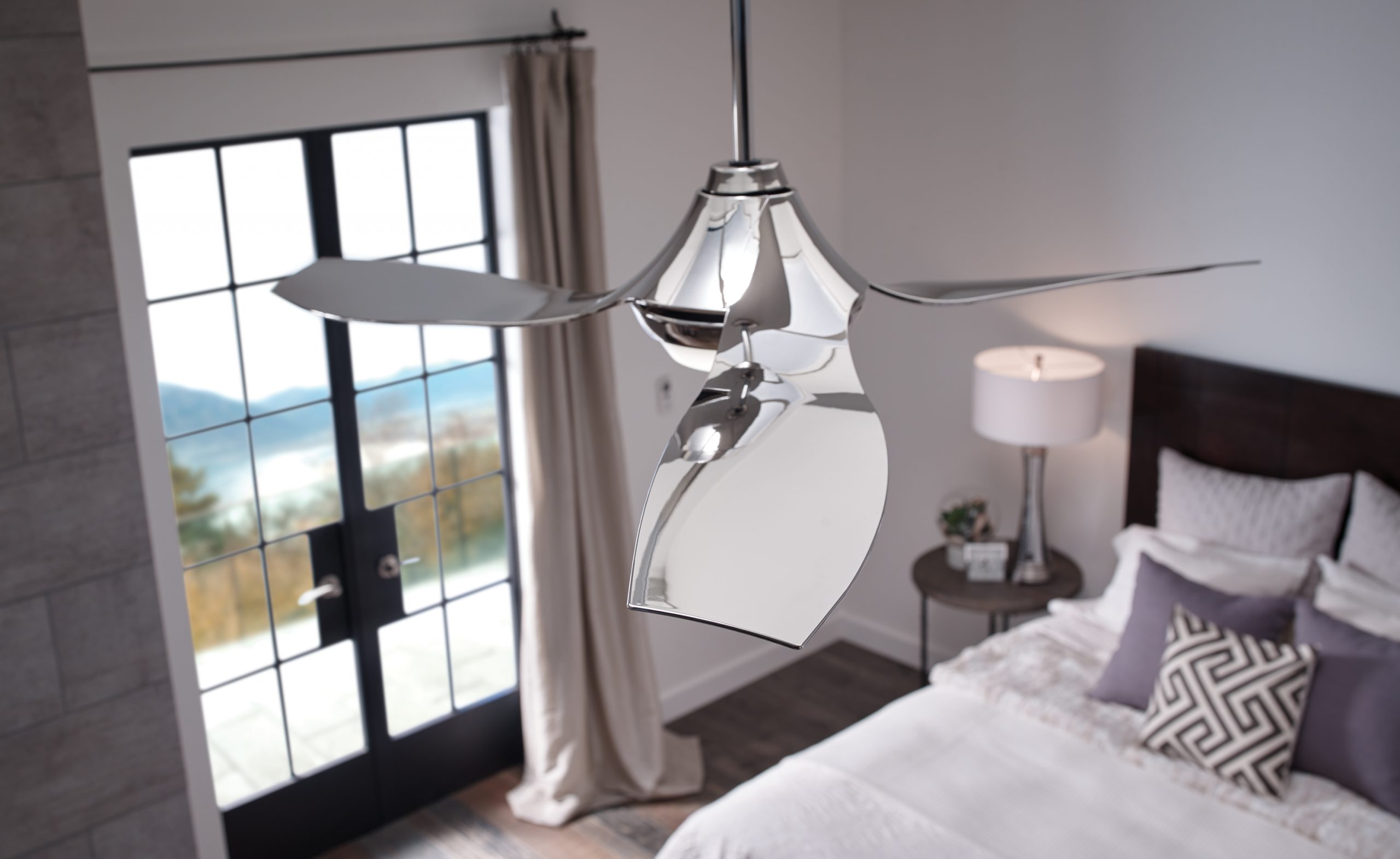 Mondern Ceiling Fan over a bed